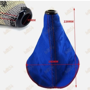 May include: A blue car shift boot with red stitching and a black top. The boot is 260mm wide at the base and 220mm tall. The top opening is 17mm. The boot has a textured pattern.