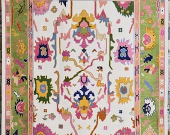 Tappeto etnico colorato con motivi tribali, verde e rosa vintage