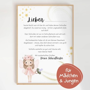 May include: A framed print with a fairy illustration and German text. The fairy is wearing a pink dress and holding a pacifier. The print includes the words "Lieber" and "Deine Schnullerfee", with a circular sticker that says "für Mädchen & Jungen".