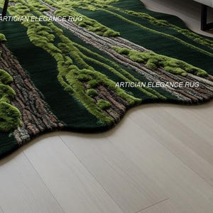 May include: A dark green rug with a forest-like design. The rug features textured areas resembling tree trunks and moss, with the text "ARTICIAN ELEGANCE RUG" visible. The rug has an irregular, organic shape and is placed on a light wood floor.