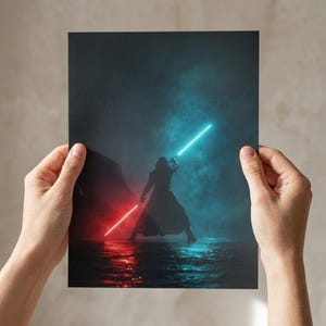 May include: A print featuring a silhouetted figure wielding two glowing lightsabers, one red and one blue, against a dark, smoky background. The scene is illuminated with vibrant colors, creating a dramatic and dynamic composition. The artwork evokes a sense of action and fantasy.