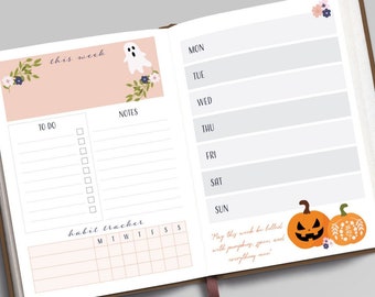 May include: A pink and white weekly planner with a ghost and floral illustrations. The planner has sections for to-do lists, notes, and a habit tracker. The planner also has a quote that says "May this week be filled with pumpkins, spice and everything nice."