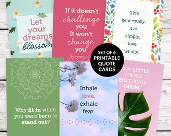 May include: Set of six printable quote cards with inspirational messages. The cards feature various floral and nature-themed designs, including a mandala, cherry blossoms, and a monstera leaf. The quotes include: "Let your dreams blossom", "If it doesn't challenge you, it won't change you", "Give generously, live simply, love wholly", "Why fit in when you were born to stand out?", "Inhale love, exhale fear", and "From little things big things grow."