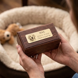 May include: A set of three ceramic mugs with a speckled, matte finish. The mugs are in shades of cream, light gray, and dark gray. Each mug has a simple, modern design and a rounded handle.