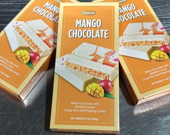Batonik z białej czekolady z mango firmy Doliche: chrupiący ryż i strzelające cukierki 7 uncji (200 g)