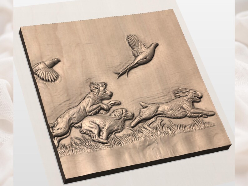 May include: A wooden relief carving showing a hunting scene. The artwork features dogs chasing a rabbit and birds in flight. The relief is carved in light brown wood, with detailed textures and shadows.