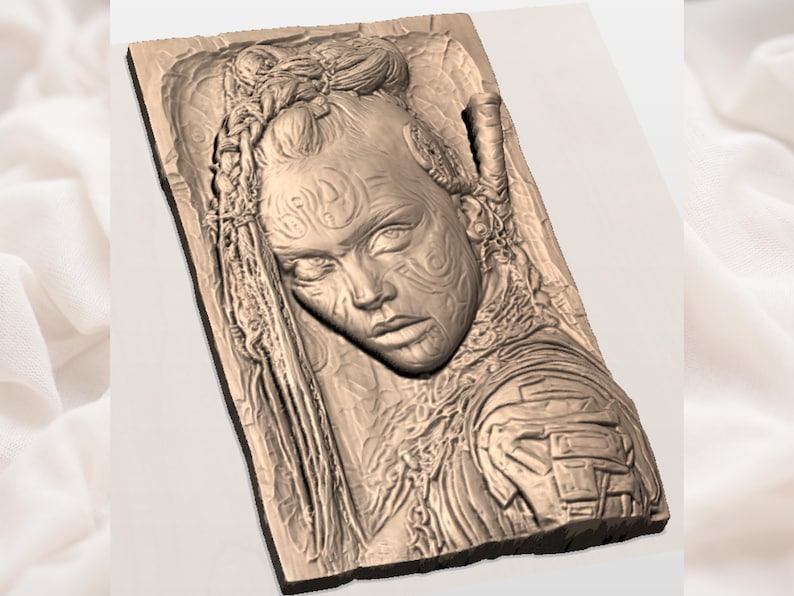 May include: A detailed relief sculpture of a woman's face with intricate tribal-style patterns carved into the skin. The woman has braided hair and is wearing armor. The sculpture is a warm, earthy brown color.