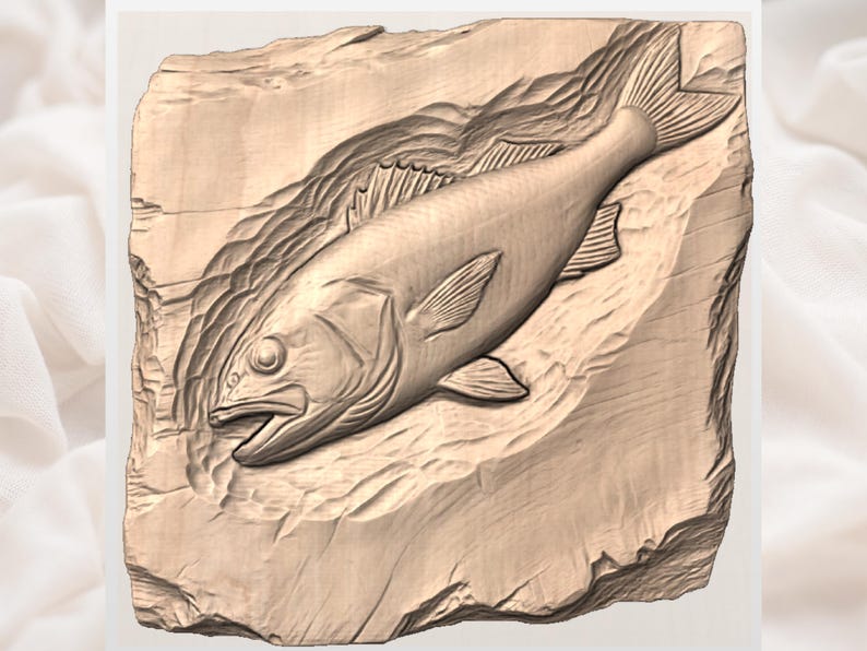May include: A detailed relief carving of a fish, showcasing the creature's form with fins and scales. The artwork is carved into a rectangular block of light brown wood, with textured details around the fish, creating a rustic aesthetic.