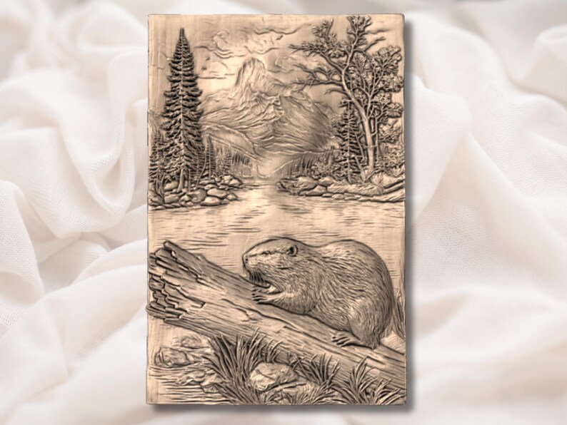 May include: A rectangular wooden carving depicting a beaver on a log in a river scene. The background features a mountain range, trees, and a body of water. The carving is in shades of brown and tan.