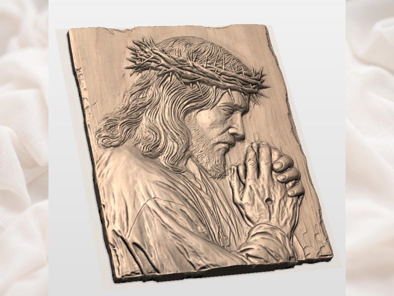 May include: A detailed relief carving of a religious figure wearing a crown of thorns, with hands clasped in prayer. The artwork is rendered in shades of brown and beige, mounted on a rectangular wooden plaque.