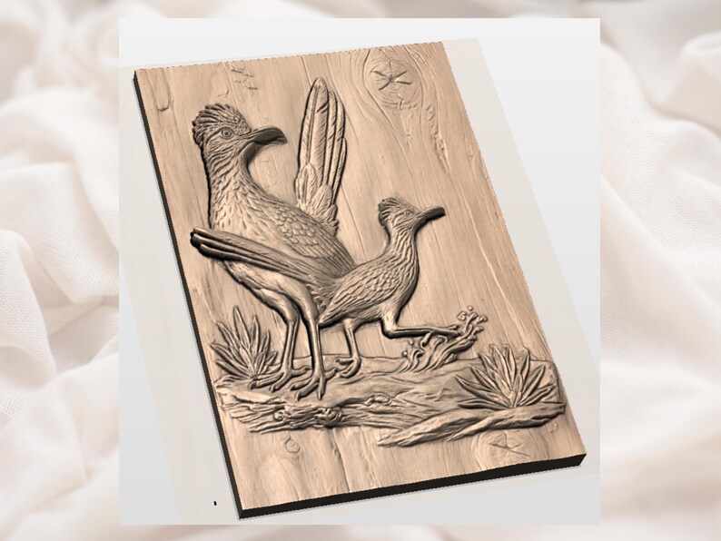 May include: A wooden relief carving of two roadrunners on a wooden plank. The birds are intricately detailed, with feathers and beaks visible. The background features a star and wood grain texture. The carving is in shades of brown.