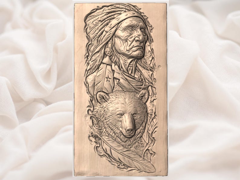 May include: A rectangular wooden carving featuring a detailed relief of a Native American chief wearing a headdress, above a bear's head. The carving includes feathers and foliage, all in a natural wood tone.