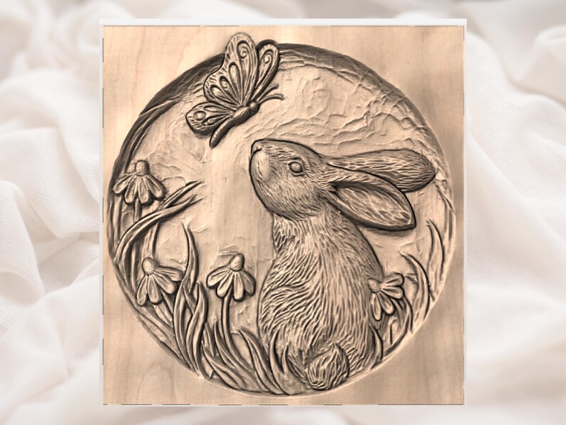 May include: A wooden relief carving featuring a rabbit gazing up at a butterfly. The artwork is set within a circular frame, surrounded by flowers and foliage. The carving is in shades of brown.