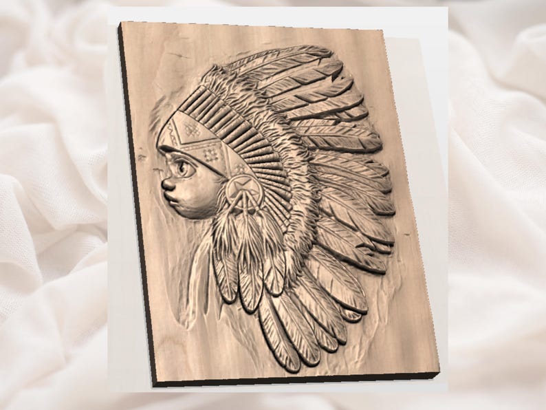 May include: A wooden relief carving of a Native American child in profile, wearing a feathered headdress. The carving is detailed, with visible textures and shadows, and is mounted on a rectangular wooden plaque.