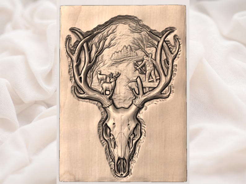 May include: A wooden plaque featuring a detailed relief carving of a deer skull with antlers. The carving depicts a hunting scene within the antlers, including trees, a hunter, and deer. The plaque is a light brown color.