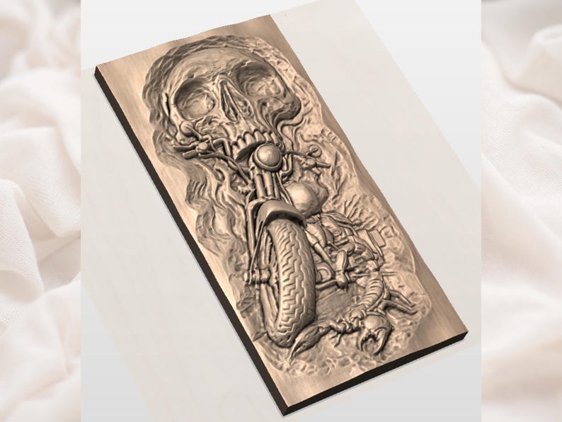 May include: A detailed relief carving on a rectangular wooden plaque. The artwork depicts a skull with a motorcycle integrated into its design. The motorcycle's front wheel and other mechanical details are visible, along with a scorpion.