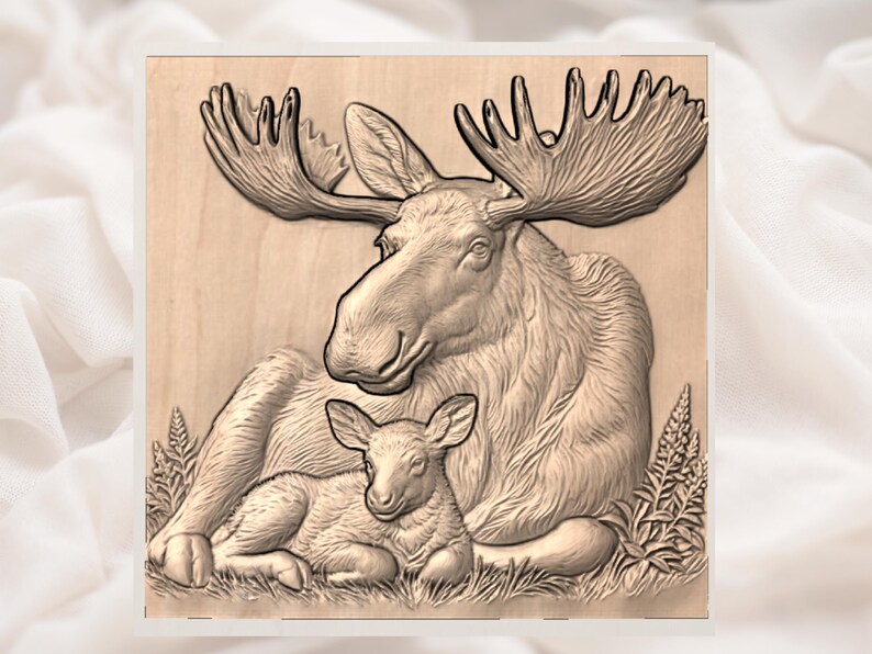 May include: A wooden relief carving of a moose and calf. The adult moose is large with prominent antlers, and the calf is nestled beside it. The carving is detailed, with textures suggesting fur and foliage. The artwork is displayed on a light-colored wooden panel.