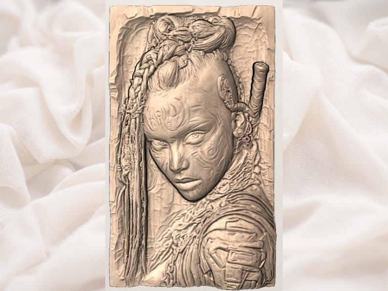 May include: A detailed relief carving of a woman's face with intricate braids and tribal tattoos. The artwork is in a rectangular format, showcasing a strong, determined expression. The carving is in shades of beige and brown.
