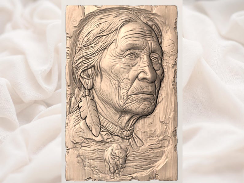 May include: A detailed relief carving of a Native American elder. The artwork features a portrait with intricate details, including a feather earring and a bison. The carving is in shades of brown and beige, suggesting a wood or stone material.