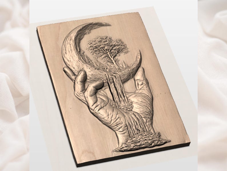 May include: A wooden relief carving showing a hand holding a crescent moon. Within the moon, a tree and waterfall are carved. The carving is on a rectangular wooden plaque with a natural wood grain.