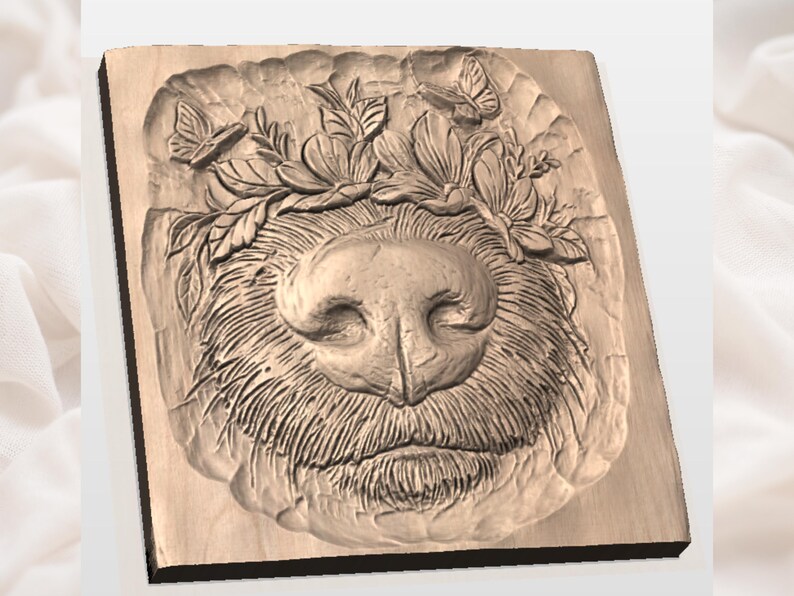May include: A wooden relief carving of a dog's face, featuring a prominent nose and mustache. The dog is adorned with a floral crown and butterflies. The artwork is carved into a rectangular wooden block, showcasing detailed textures and patterns.