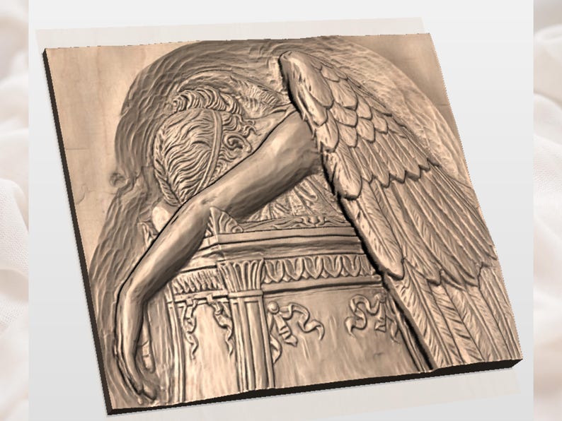 May include: A wooden relief carving depicts a winged figure with bowed head and outstretched arm. The figure's detailed wings and flowing hair are visible. The carving is mounted on a rectangular wooden base, showcasing intricate details.
