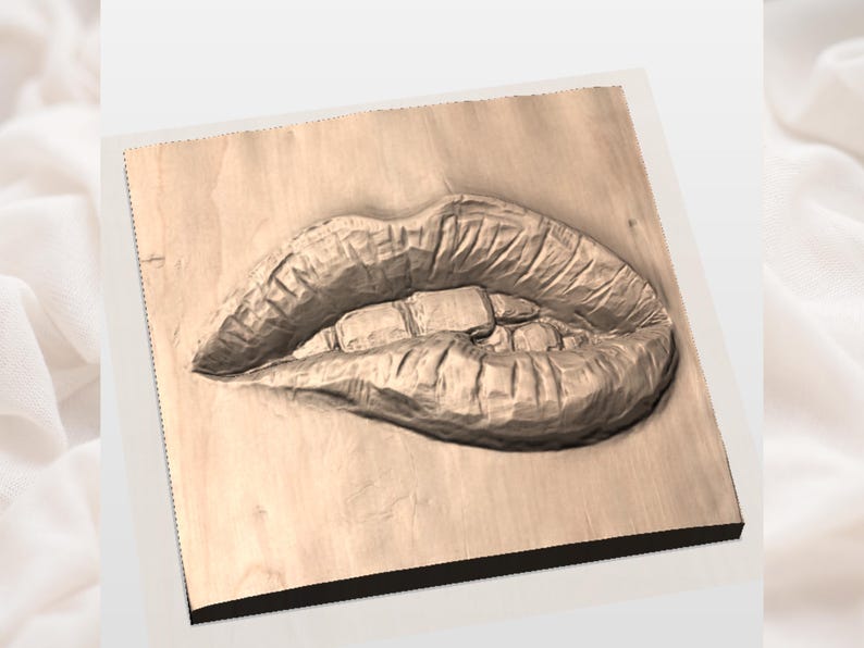 May include: A wooden carving of a pair of lips, with detailed texture and shading. The lips are slightly parted, revealing the teeth. The carving is mounted on a square wooden plaque.