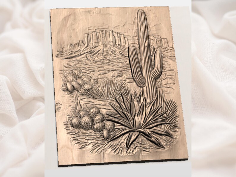 May include: Wooden carved art piece depicting a desert landscape. The artwork features a saguaro cactus, agave plant, and other desert flora, with a mountain range in the background. The carving is detailed and shows the texture of the wood.