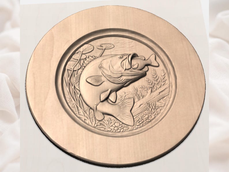May include: A round, wooden plaque featuring a detailed relief carving of a largemouth bass eating a smaller fish. The design includes aquatic plants and reeds, all in a natural wood tone.