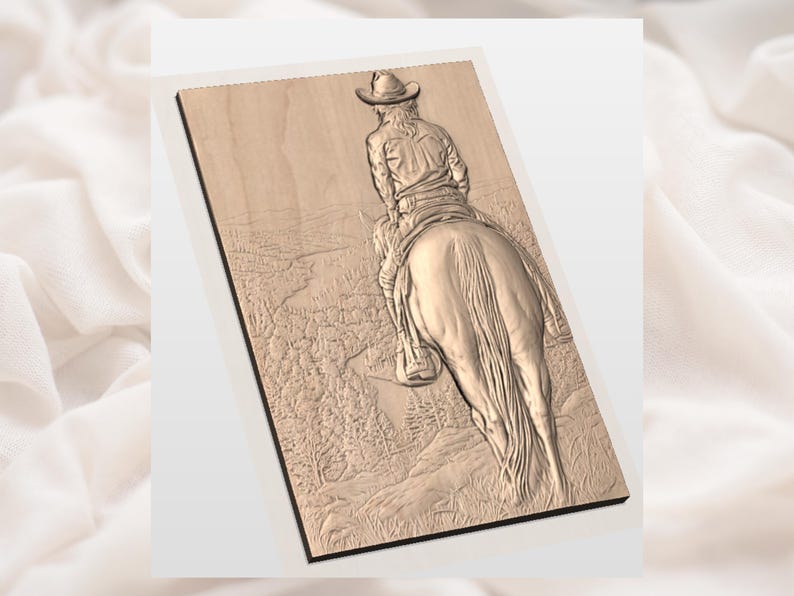 May include: Wooden relief carving of a cowboy on horseback, viewed from the rear. The cowboy wears a hat and is riding through a landscape of trees and hills. The carving is in shades of brown and tan.