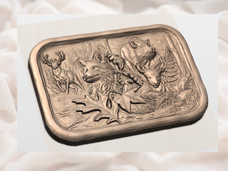 May include: A rectangular, bronze-coloured relief carving featuring forest animals. A deer, fox, boar, and fawn are depicted amidst foliage, including maple leaves and ferns. The detailed carving evokes a woodland scene.