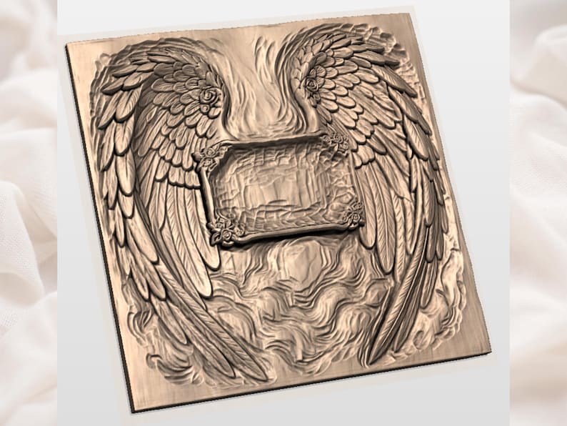 May include: A detailed, square relief carving featuring angel wings and a central rectangular frame. The wings are intricately carved with feather details, and the frame has floral accents. The overall design is in a warm, earthy tone.