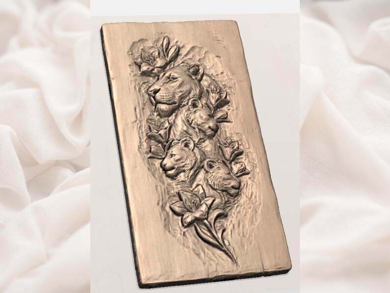 May include: A rectangular wooden plaque featuring a relief carving of a lion family amidst floral elements. The design includes a lioness and her cubs, surrounded by roses and lilies, all in a natural wood tone.