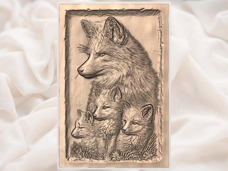May include: A detailed wood carving of a fox and three kits. The adult fox is in profile, with the kits clustered below in a grassy area. The artwork is in shades of brown and tan, with fine lines and textures.
