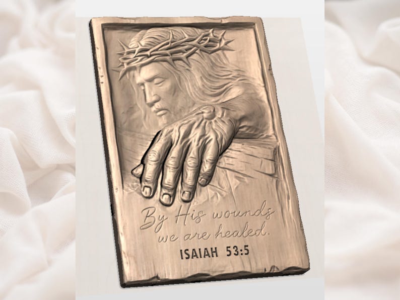 May include: A rectangular, bronze-colored relief sculpture depicting a figure wearing a crown of thorns, with a hand reaching out. The text "By His wounds we are healed. ISAIAH 53:5" is inscribed below the hand.