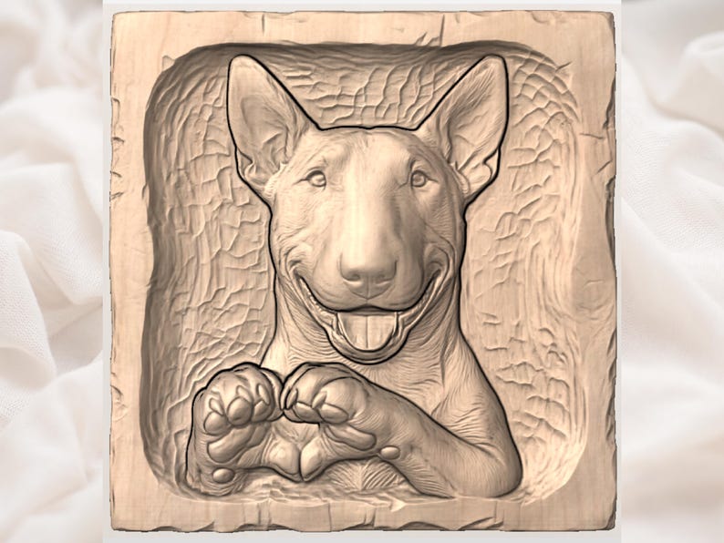 May include: A wooden relief carving of a Bull Terrier dog. The dog is smiling with its tongue out and its paws are crossed. The carving is in a square frame with a textured background.
