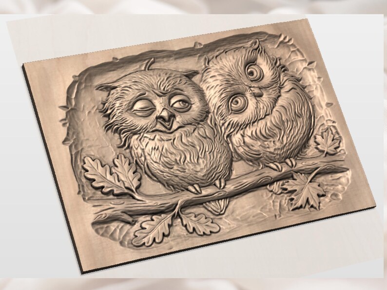 May include: A wooden relief carving of two owls perched on a branch with leaves. The owls have detailed feather textures and are set against a textured background. The carving is in shades of brown.