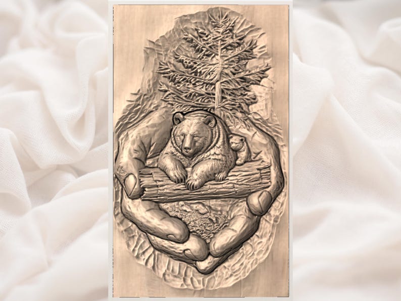 May include: A wooden relief carving showing a bear and cub resting on a log, held within hands. A detailed tree and forest scene is carved above the bears. The artwork is in shades of brown.