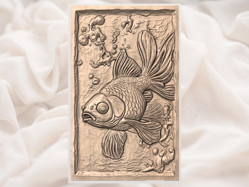 May include: A detailed relief carving of a goldfish swimming in water, with bubbles and aquatic plants. The artwork is in a rectangular frame, showcasing the fish's scales and flowing fins. The color is a warm, neutral tone.