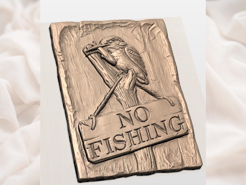 May include: A bronze-colored wooden sign with a detailed carving of a bird perched on a branch. The sign reads "NO FISHING" in bold letters, with a rope-like border. The bird is holding a fishing line.