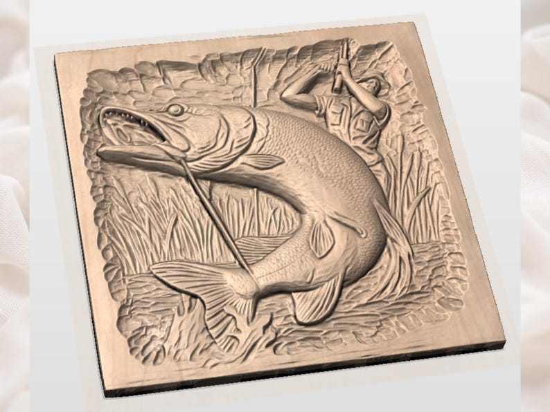 May include: A detailed wood carving depicts a fisherman reeling in a large fish. The relief carving shows the fish with an open mouth, a fishing line, and the fisherman in the background. The artwork is set against a backdrop of tall grass and a rocky shoreline.