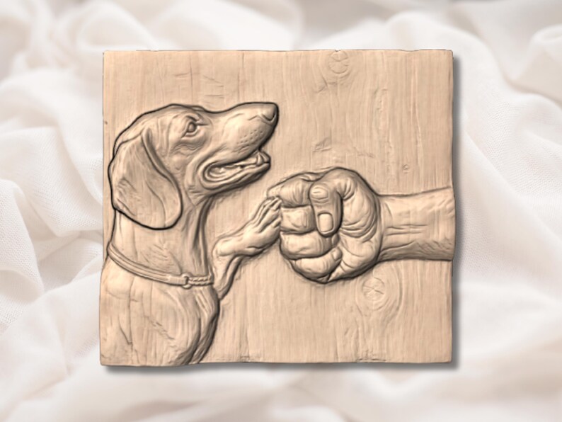 May include: A wooden relief carving depicts a dachshund dog giving a paw to a human fist. The dog is detailed with a collar, and the hand is clenched in a fist. The artwork is in shades of brown and beige, with visible wood grain.