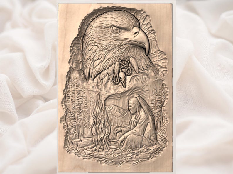 May include: A detailed wooden carving featuring a bald eagle's head and a Native American figure. The eagle is depicted with sharp detail, and the figure is seated near a forest. The artwork is framed with a decorative border.