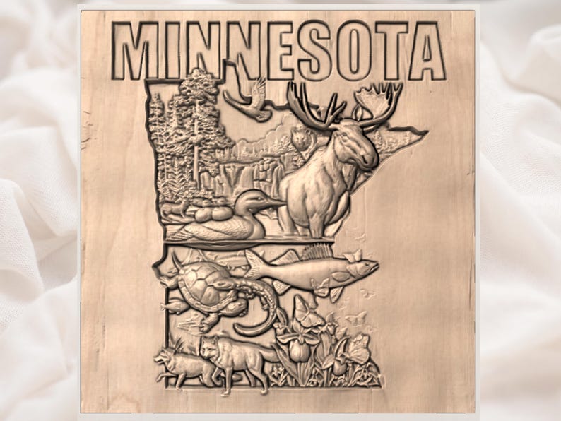 May include: Wooden carving of the state of Minnesota, featuring the state name at the top. The carving includes a moose, loon, fish, turtle, and wolves, along with a waterfall and trees.