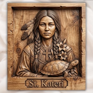 May include: A square wooden wall plaque featuring a relief carving of St. Kateri Tekakwitha. The figure has braided hair with feathers, wears a cross necklace, and holds a turtle. Lily flowers are carved beside the figure. The text St. Kateri is carved into a rectangular panel at the bottom of the piece.