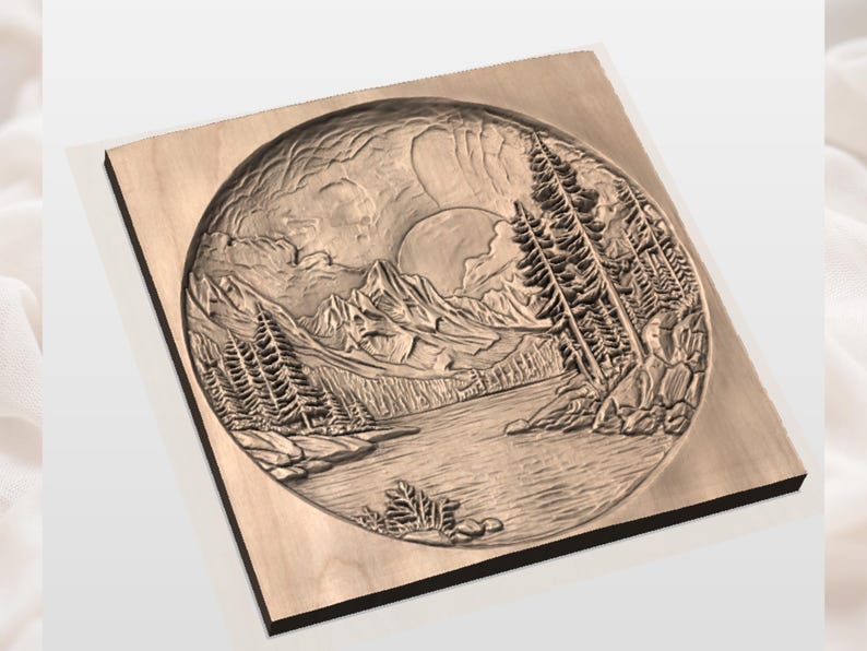 May include: A wooden relief carving depicting a mountain landscape with a lake, trees, and a setting sun. The circular design is set within a square wooden frame, showcasing detailed textures and natural elements.