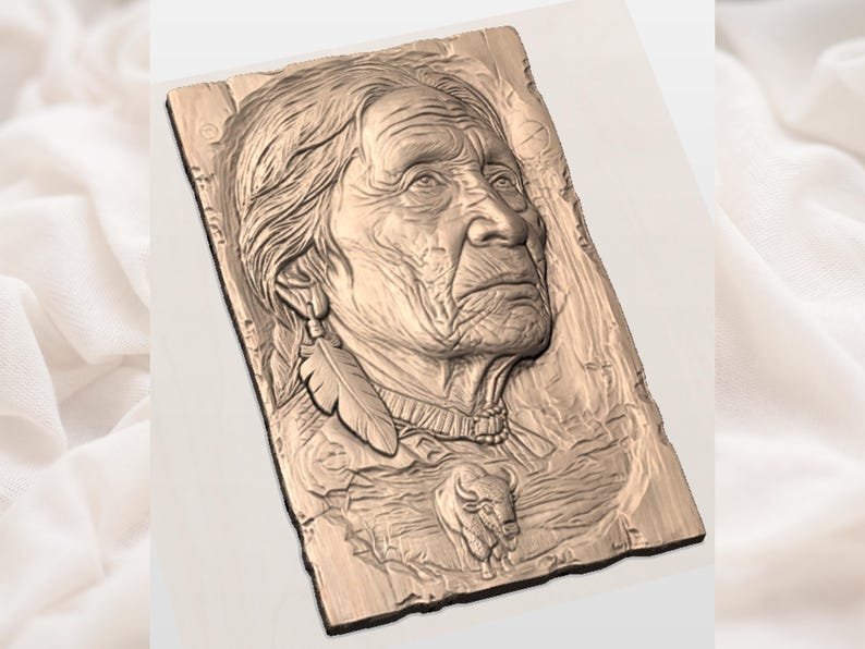May include: A detailed wood carving of an elderly Native American person in profile. The carving features a feather earring, a necklace, and a small bison. The artwork is on a rectangular wooden plaque with a textured surface.