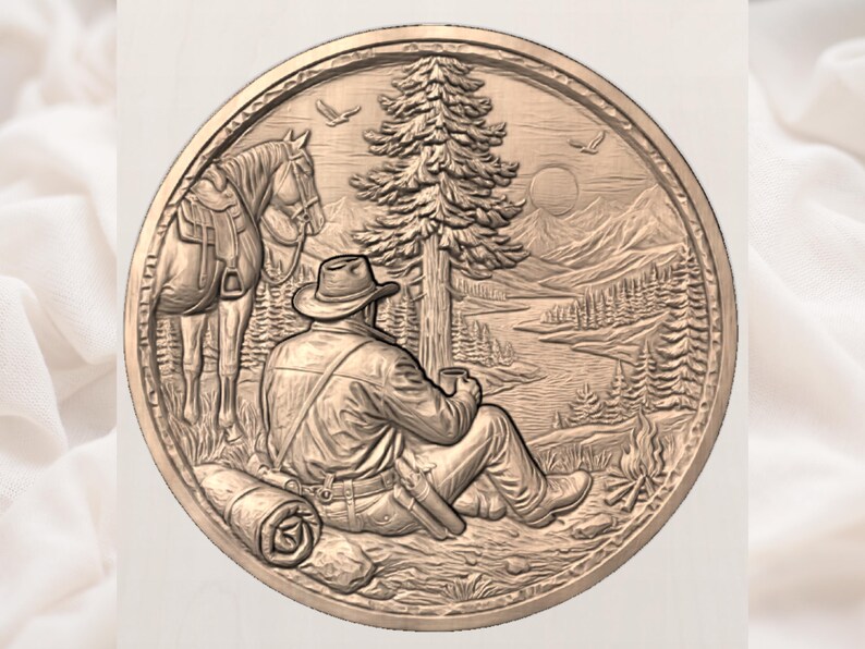 May include: A circular relief carving depicts a cowboy seated, gazing at a mountain landscape with a horse nearby. The detailed artwork features a cowboy hat, a tree, and a roll of bedding. The relief is in a warm, earthy tone.