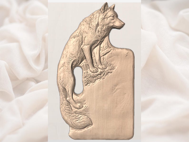 May include: A detailed, bronze-colored sculpture of a wolf perched atop a rectangular, keyhole-shaped design. The wolf is depicted in a realistic style, with intricate fur detailing. The sculpture has a textured surface and is set against a neutral background.