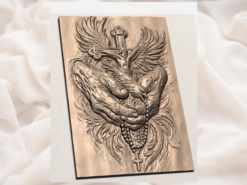 May include: A detailed relief carving depicts hands holding a rosary and a crucifix with a figure of Jesus. Above, a cross and wings are carved into the wood. The artwork is in shades of brown and beige.